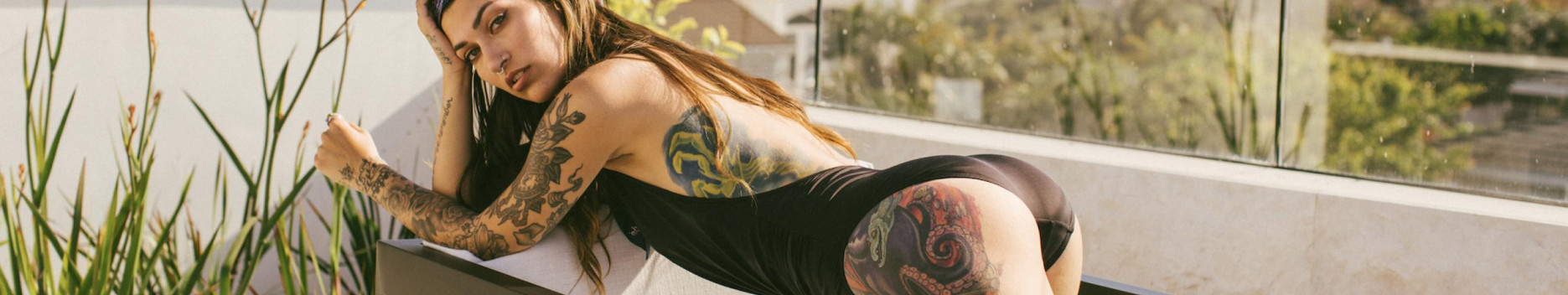 Background tattooed girl next door